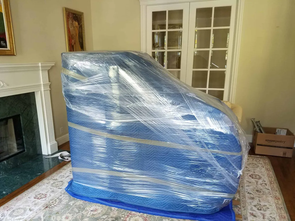 Piano being loaded for transport